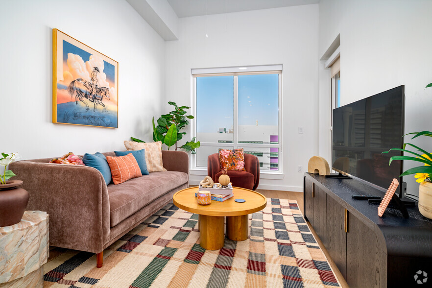 1BR, 1BA - 555SF - Living Room - The Continental Residences