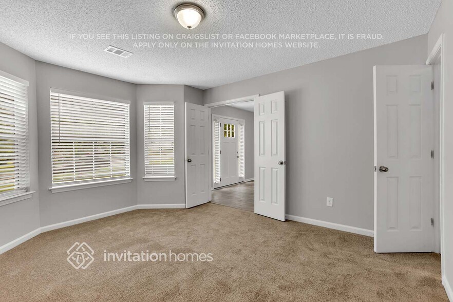 Building Photo - 5614 Carriage Walk Way