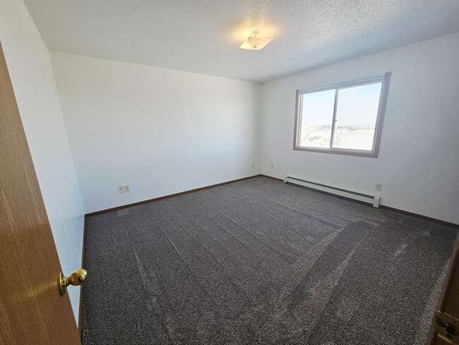 Building Photo - Fully Remodeled 1,250 Sq Ft 2 Bedroom Apartment with Garage, In-Unit Laundry & Private Balcony – ...