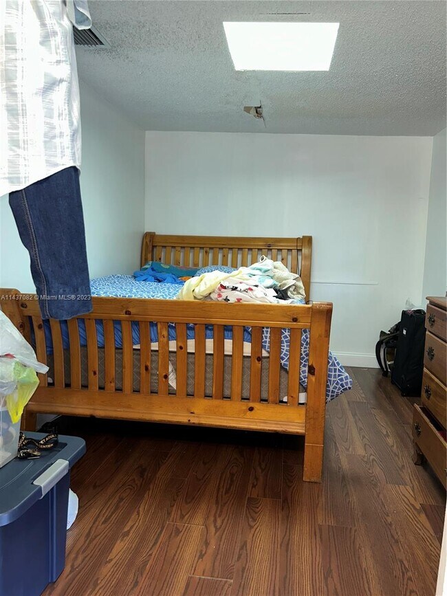 Building Photo - 5891 W 9th Ln