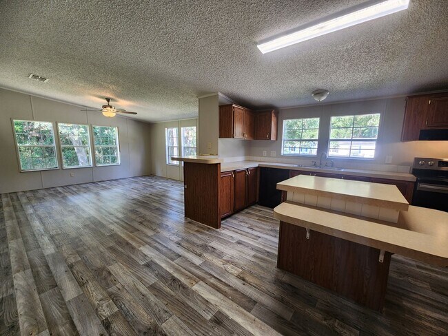 Building Photo - 3 Bed 2 Bath  FENCED land w/ Workshop 3 Miles from WEC!