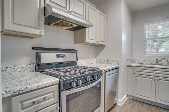 Building Photo - Updated 3-Bedroom, 2-Bath Ranch with Fenced Backyard, Carport, and Modern Kitchen