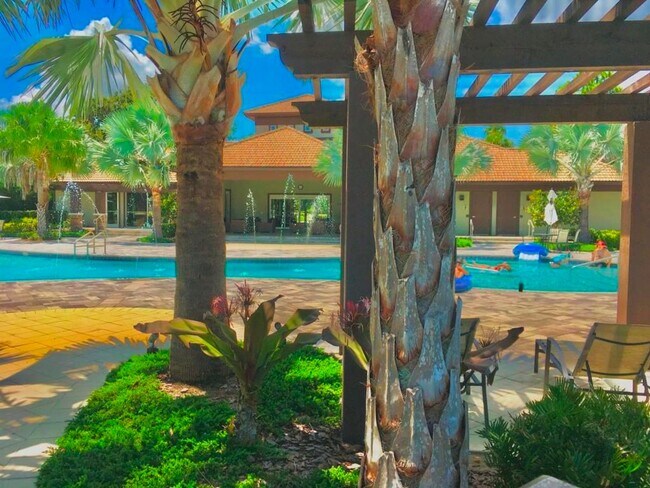 Building Photo - BEAUTIFUL CHAMPIONSGATE HOME WITH LAKE VIEW