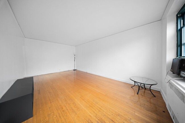 Building Photo - 34-40-40 79th St