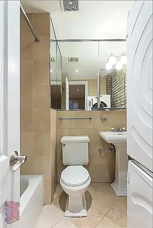 Building Photo - 330 East SIXTH Street