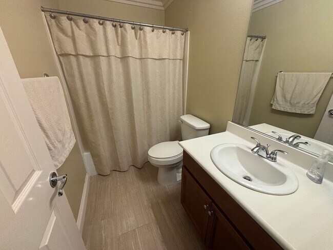 Building Photo - Spacious 4-Bedroom Home with Community Ame...