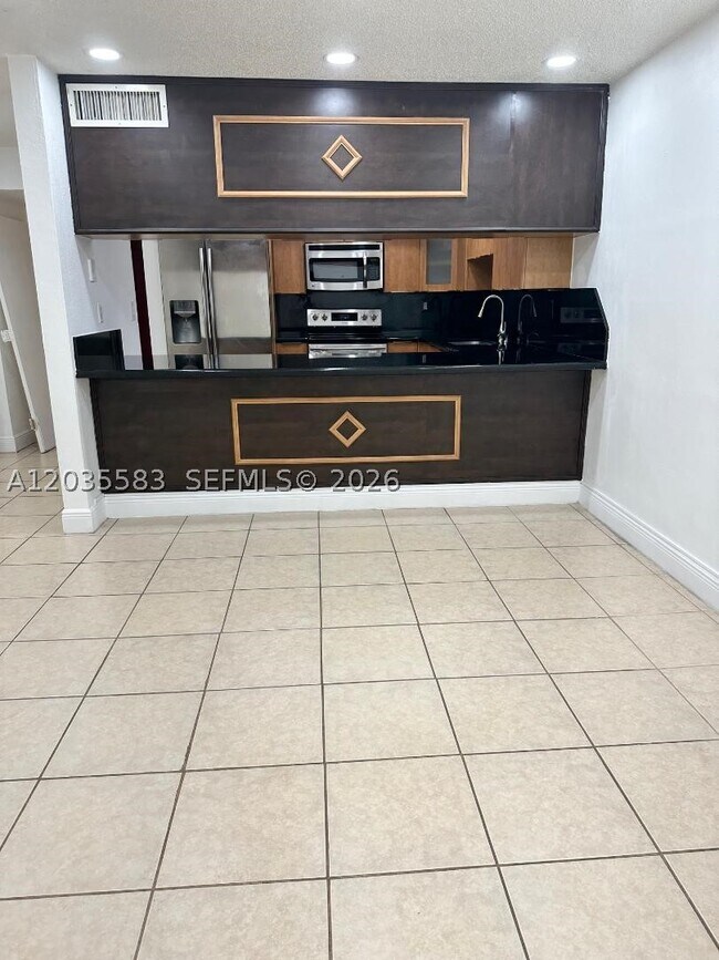 Building Photo - 7205 W 3rd Ct