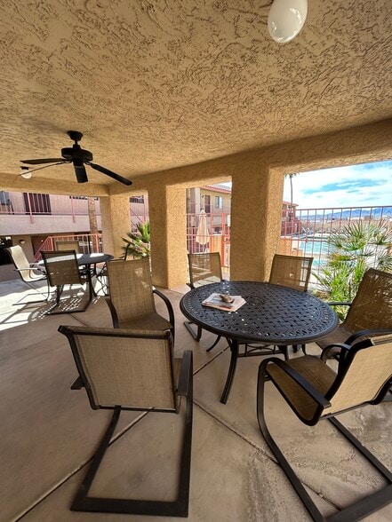Seating area by pool - 1957 Mesquite Ave