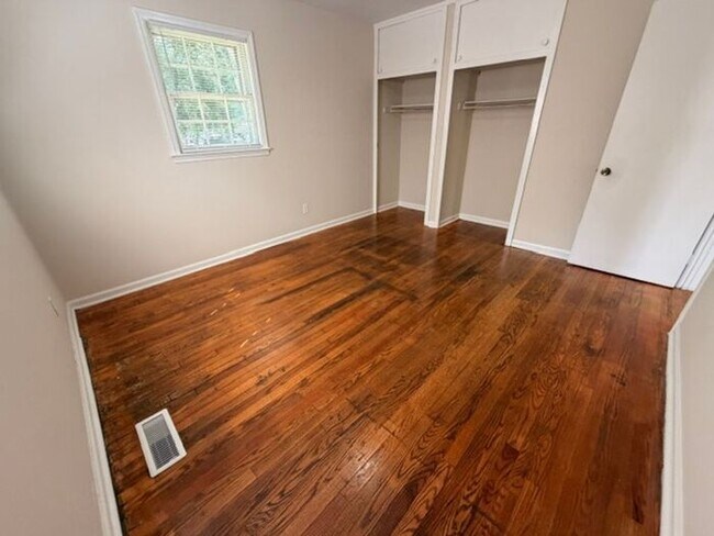 Building Photo - Three bedroom brick home available now!