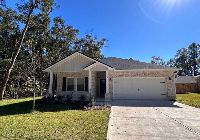 Primary Photo - Brand New 3/2 home with fenced yard