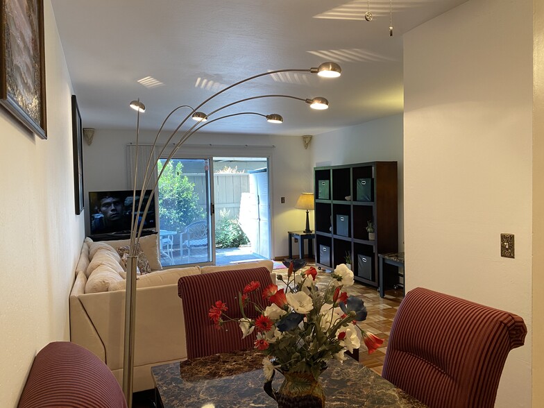 Living room with patio view marble - 1720 Halford Ave