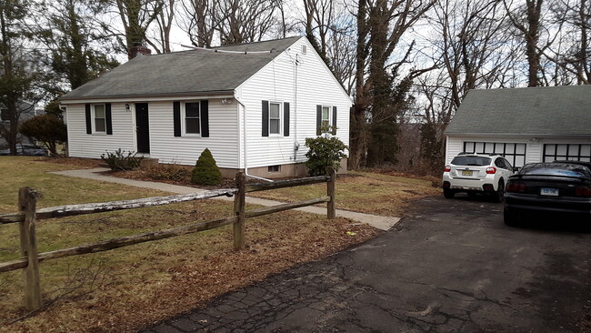 Front View with 2-car Garage - 1029 Hartford Tpke