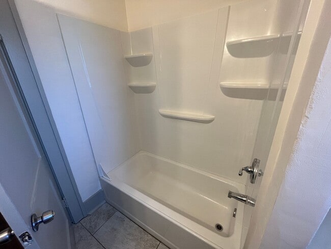 Building Photo - Spacious 4-Bedroom, 2-Bath Home with Porches & Basement