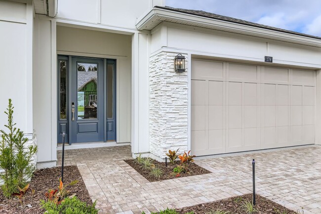 Building Photo - Resort-Style Furnished Lakefront Living in SilverLeaf | 100” Theater & Golf Cart Included