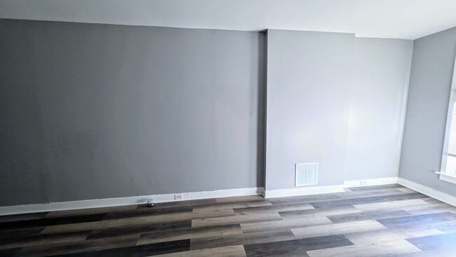 Building Photo - Beautiful Two Bedroom, Plus a Pass Through Room with a Fenced in Rear Patio