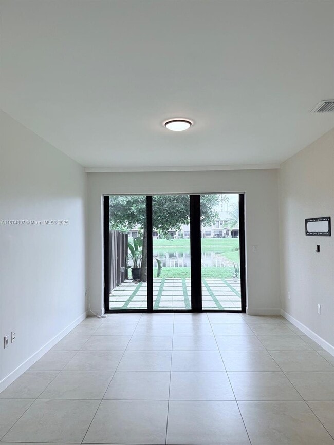 Building Photo - 5980 NW 104th Ct