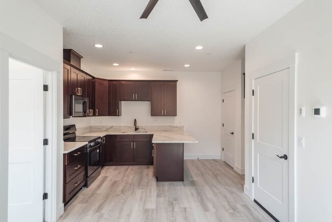 Building Photo - NEW CONSTRUCTION 1BD W/GARAGE & YARD