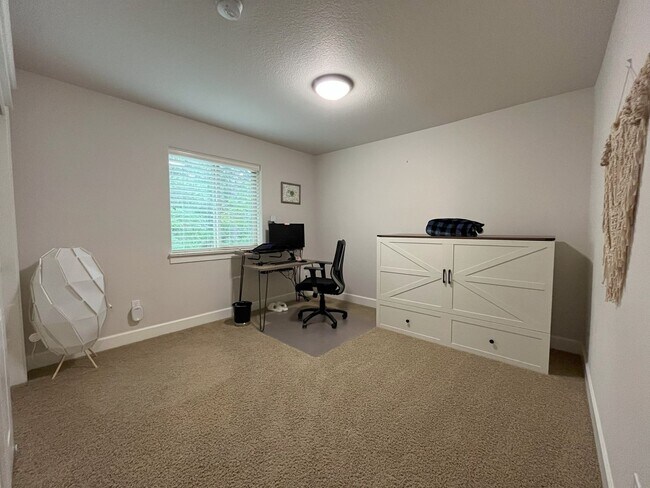 Building Photo - Spacious Corner-Lot Home with Three Levels...