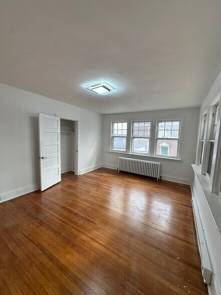 Bedrooms with original wood floors, LARGE walk in closets. - 328 High St