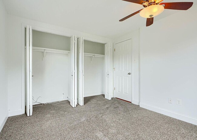 Building Photo - Updated End-of-Group Townhome with Finished Lower Level, Fenced Yard & Community Pool
