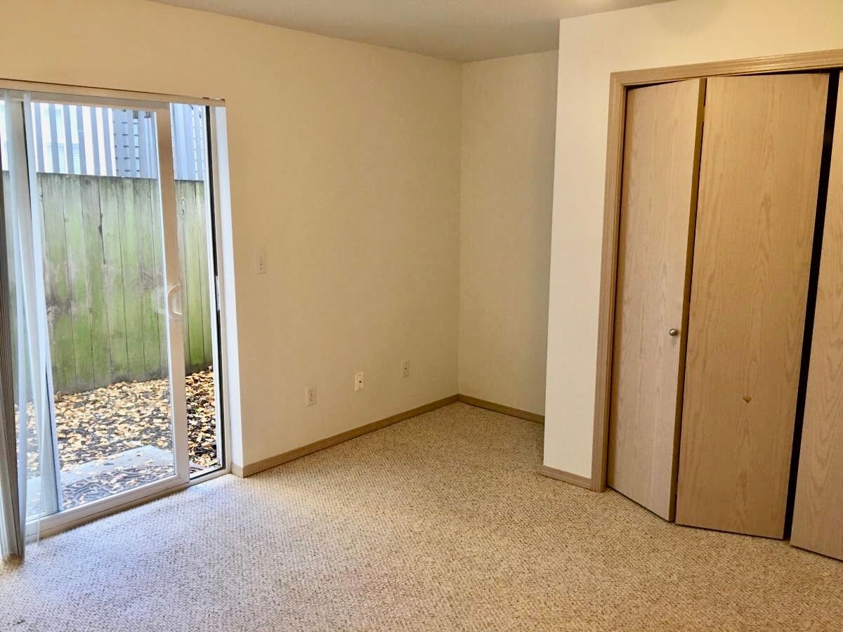 First floor bedroom with patio - 7543 11th Ave NE #B