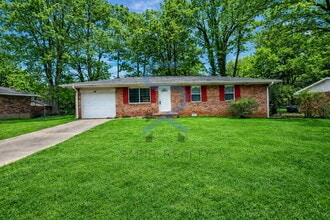Building Photo - Timeless Ranch Charm in a Vibrant, Peaceful Corner of South River Gardens