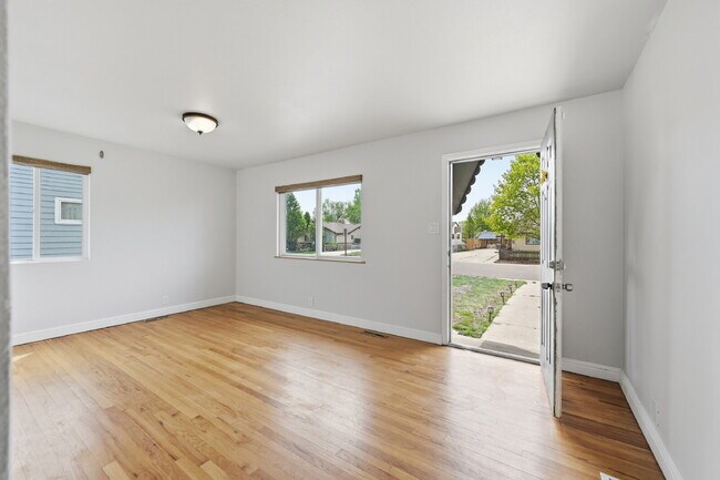 Building Photo - $2,140.95 -  2 bed, 1 bath located in Denver with a big backyard and In Unit Laundry!