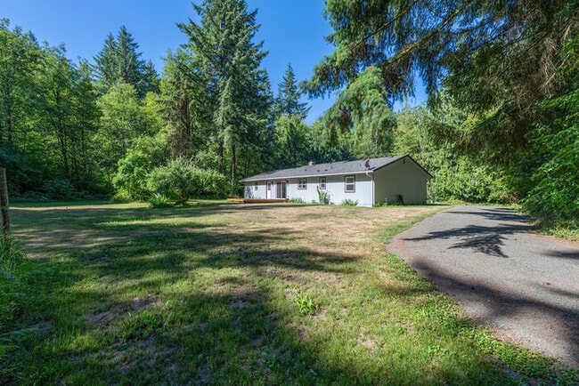 Building Photo - BEAUTIFUL UPDATED RAMBLER WITH LARGE GARGE