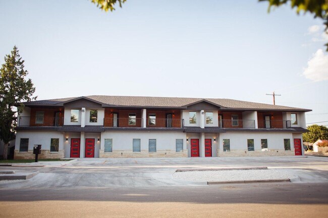 Building Photo - AUGUST MOVE-IN SPECIAL: 4 Private Suites • Walk to Texas Tech • Modern Finishes