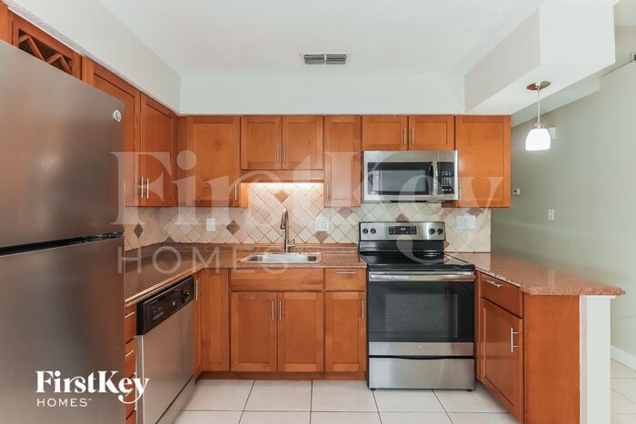 Building Photo - 8908 N Hamner Ave