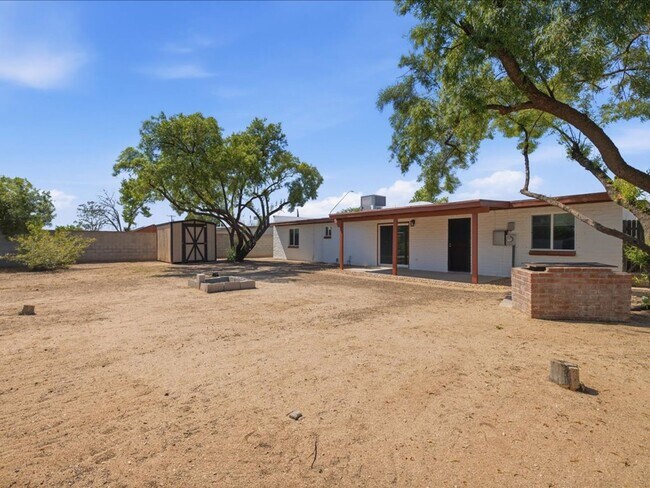 Building Photo - Concept Living with Large Enclosed Backyard & Modern Upgrades!