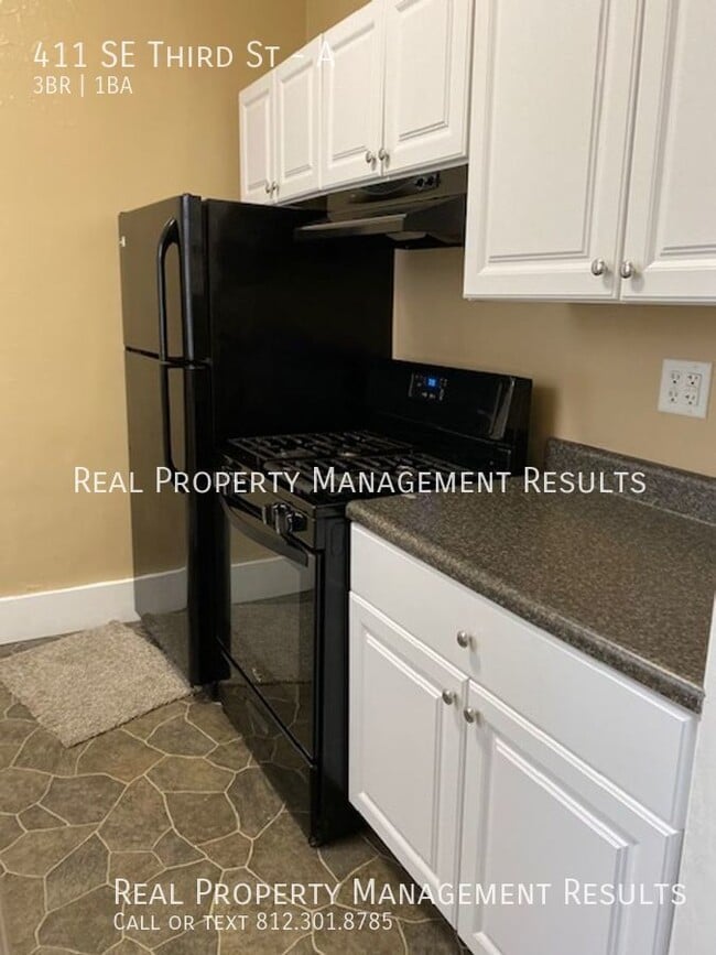 Building Photo - 411 SE Third St-A