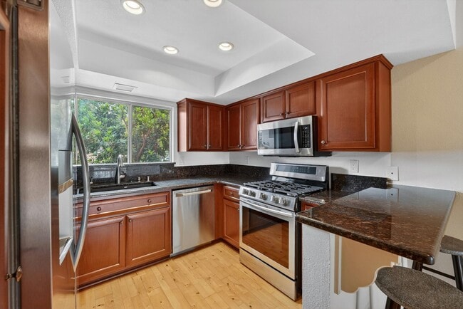 Building Photo - Gated Lake Forest Condo | Pool, Spa, Washer/Dryer & 3 Parking Spaces