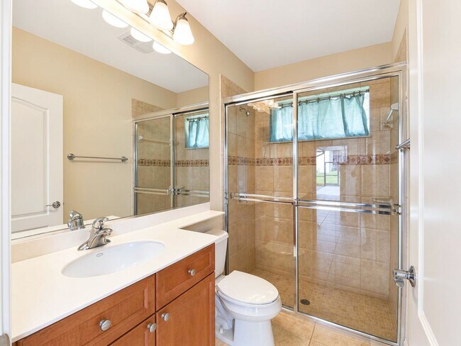 Building Photo - Now Available for Rent – 4/3 with flex room
