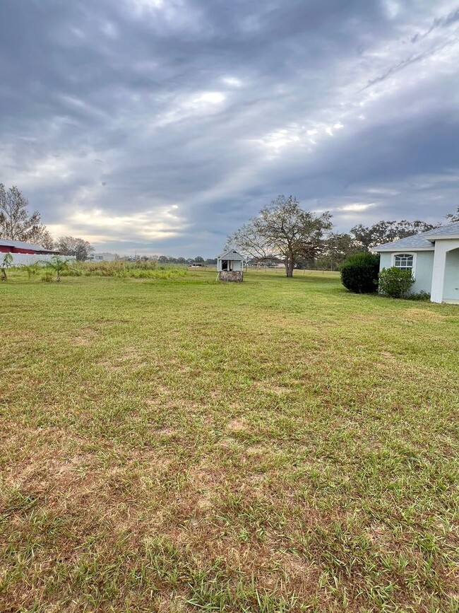 Building Photo - 3/2 Home in Myakka with ACERAGE/ POOL