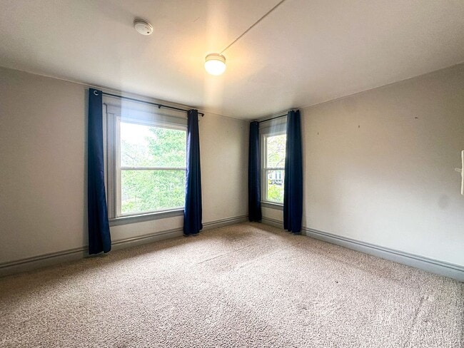Building Photo - A home where old-world charm meets modern sophistication!