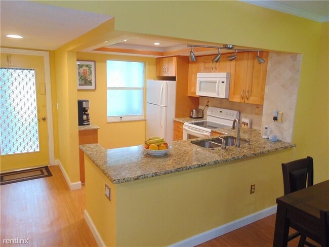 Building Photo - 2 br, 2 bath Condo - 9880 Marina Blvd Apt ...