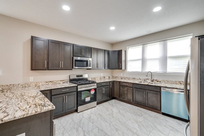 Building Photo - Brand-New 3-Bed, 2.5-Bath Condo: Modern Co...