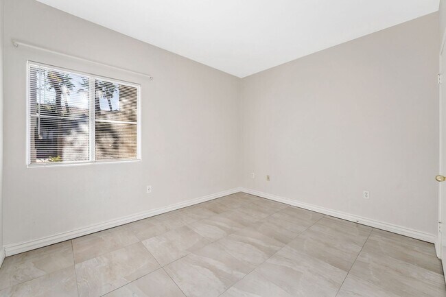 Building Photo - Modern Gated Condo with Upgraded Interior and Attached Garage in Prime South Las Vegas Location!