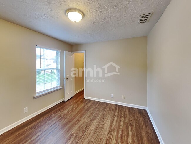 Building Photo - 7827 Rainey Dr