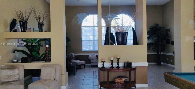 Building Photo - 3221 Sabal Palm Manor