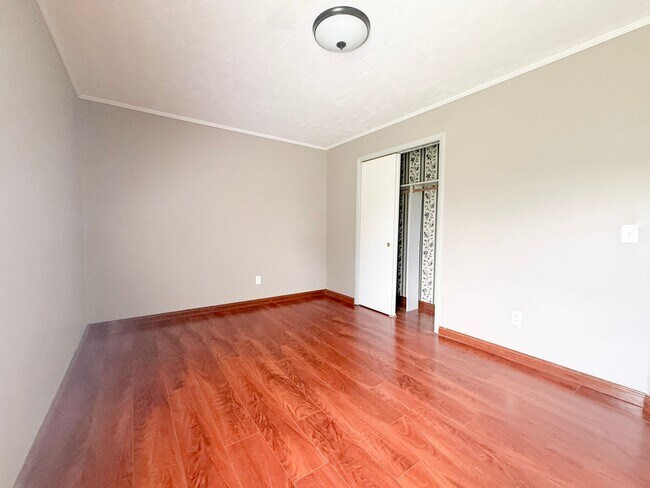 Building Photo - Spacious 3-Bedroom Home with Huge Yard, Covered Porches & Storage Building