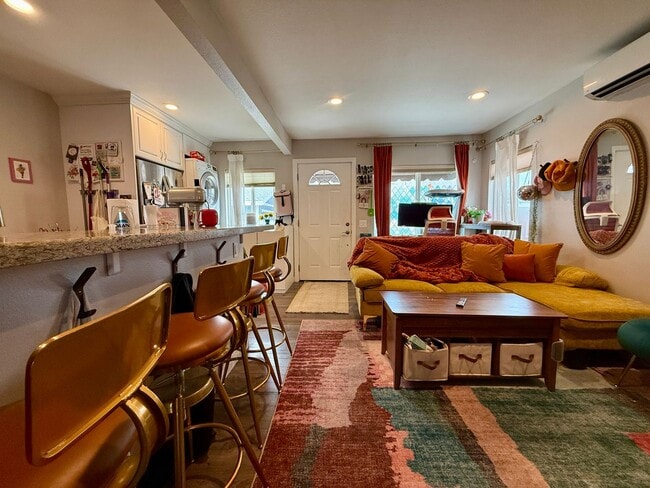 Building Photo - Modern Bungalow with W/D + A/C! Assigned Parking Included & 1 Garage Storage!