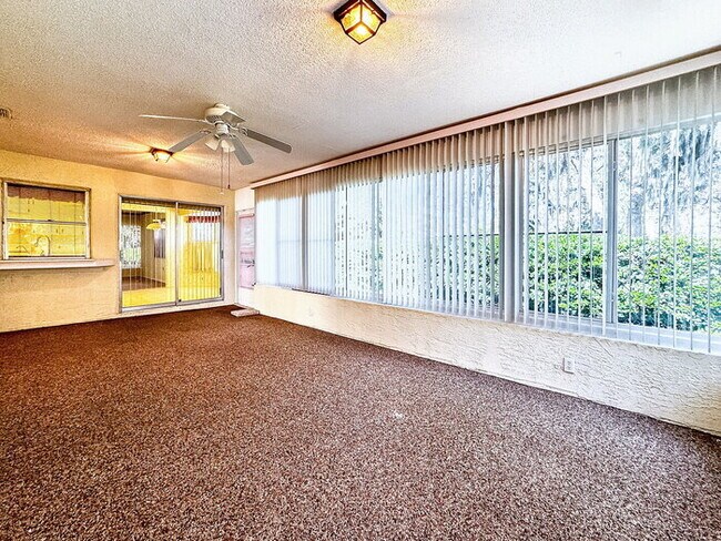 Building Photo - 55 & OLDER COMMUNITY! Charming 2-Bedroom Oasis with 2 Full Baths and 1,747 Sq Ft in New Port Richey!