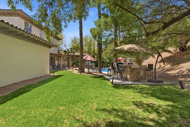 Building Photo - Private Gated Christopher Homes Estate in The Vineyards | Resort-Style Backyard & Strip Views