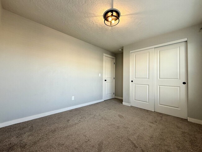 Building Photo - TAKE A LOOK A THIS GORGEOUS HOME NESTLED I...