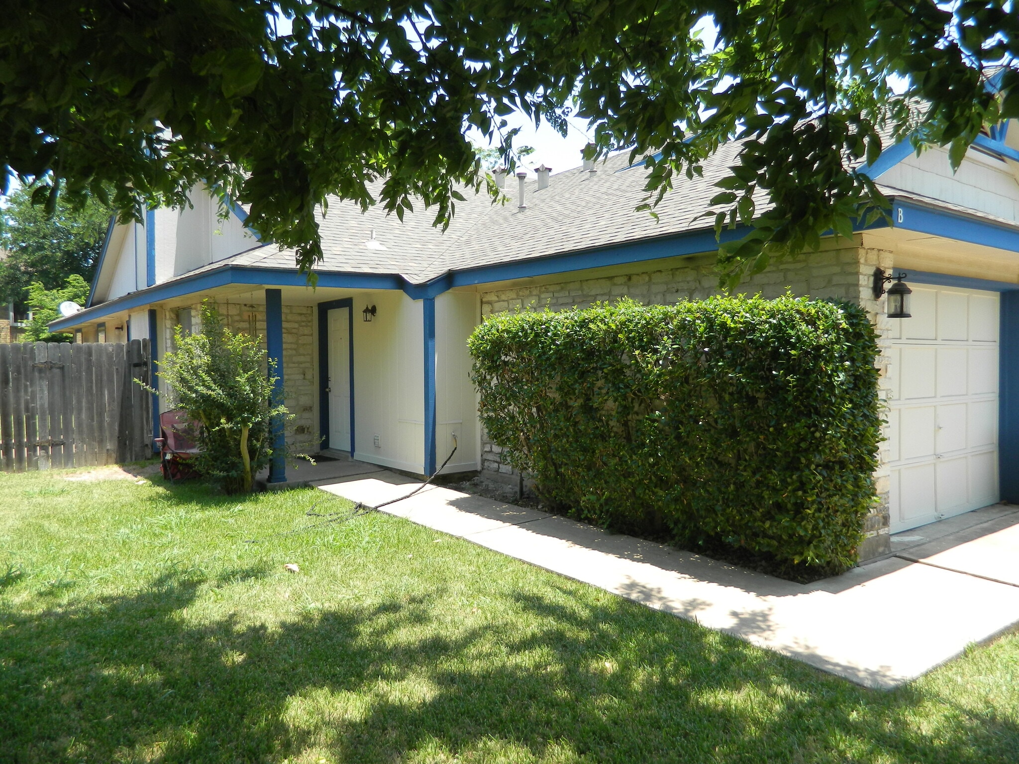 Privacy Entrance to unit on north side of duplex - 7806-B Chimayo Cv.,