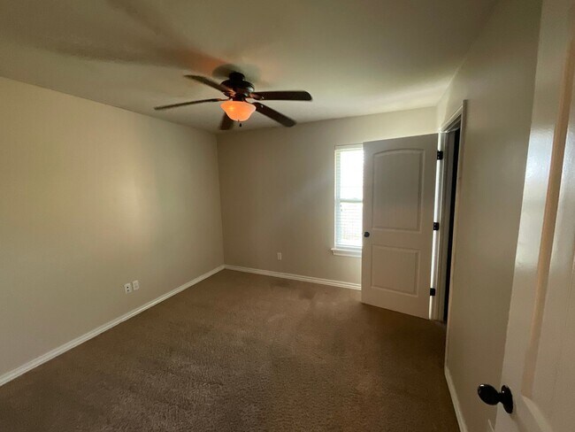 Building Photo - 4 bed, 2 bath, 2 car garage, 12-14 person Storm Shelter