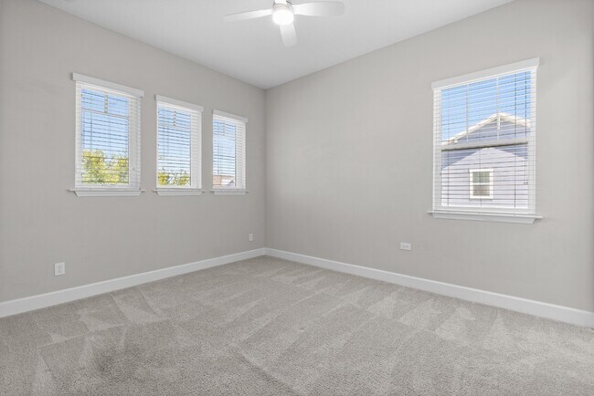 Building Photo - Move In Ready End Unit Townhome in Laureate Park | 3 Bed | Tesla Charger