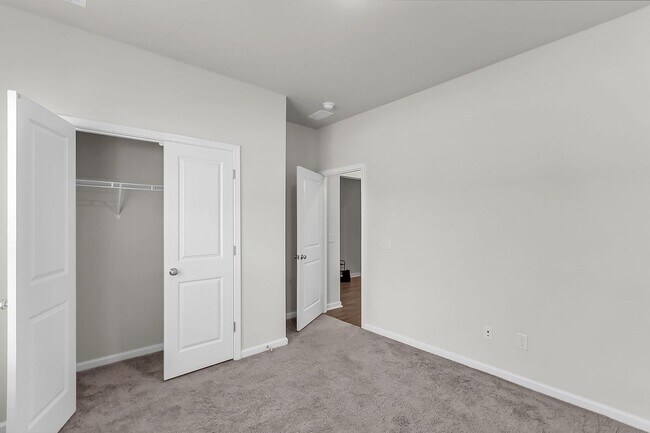 Building Photo - Spacious 4-Bedroom Home with Modern Upgrad...